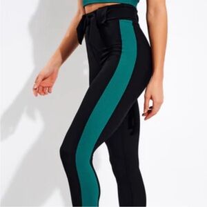 NWT. Year of Ours thermal ski belted legging in black/winter green. Size Small.